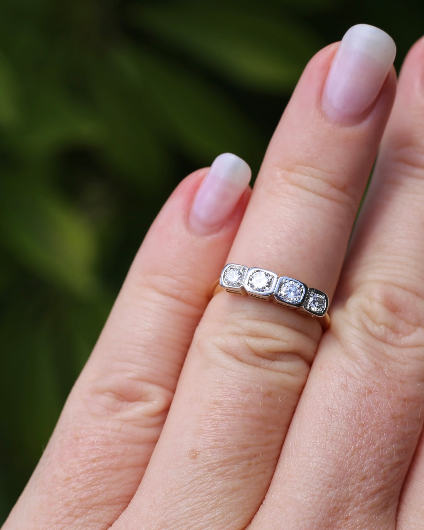 Circa 1930s Four Stone "Quadrillo" Diamond Ring, 18ct Yellow Gold and Paladium, size just over K1/2 or just over 5.5, 3.04g, with valuation