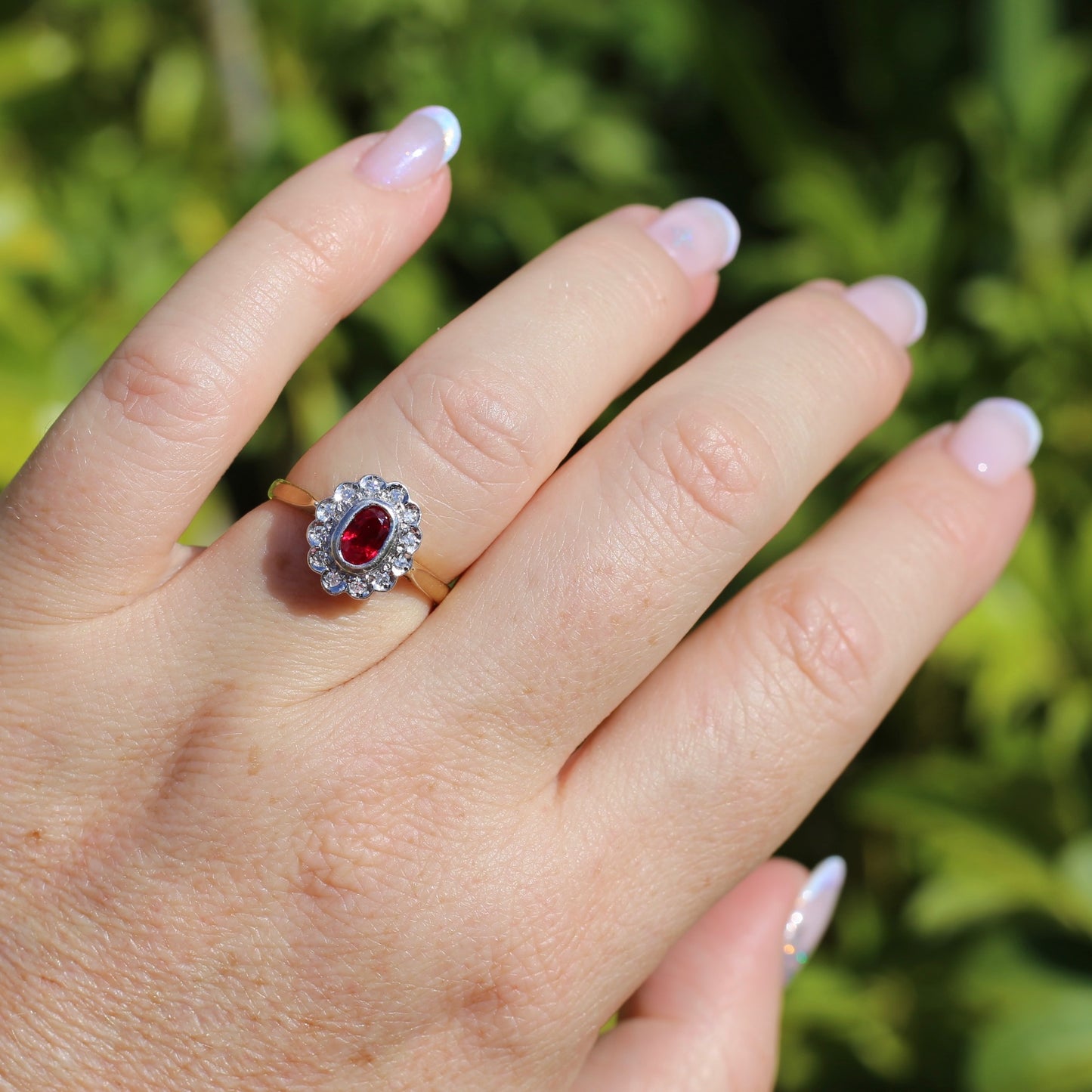 Ruby and Diamond Halo, 18ct Yellow and White Gold, size P or 7.75 with valuation