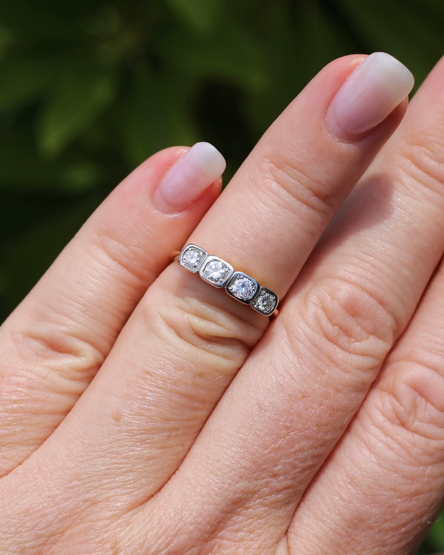 Circa 1930s Four Stone "Quadrillo" Diamond Ring, 18ct Yellow Gold and Paladium, size just over K1/2 or just over 5.5, 3.04g, with valuation